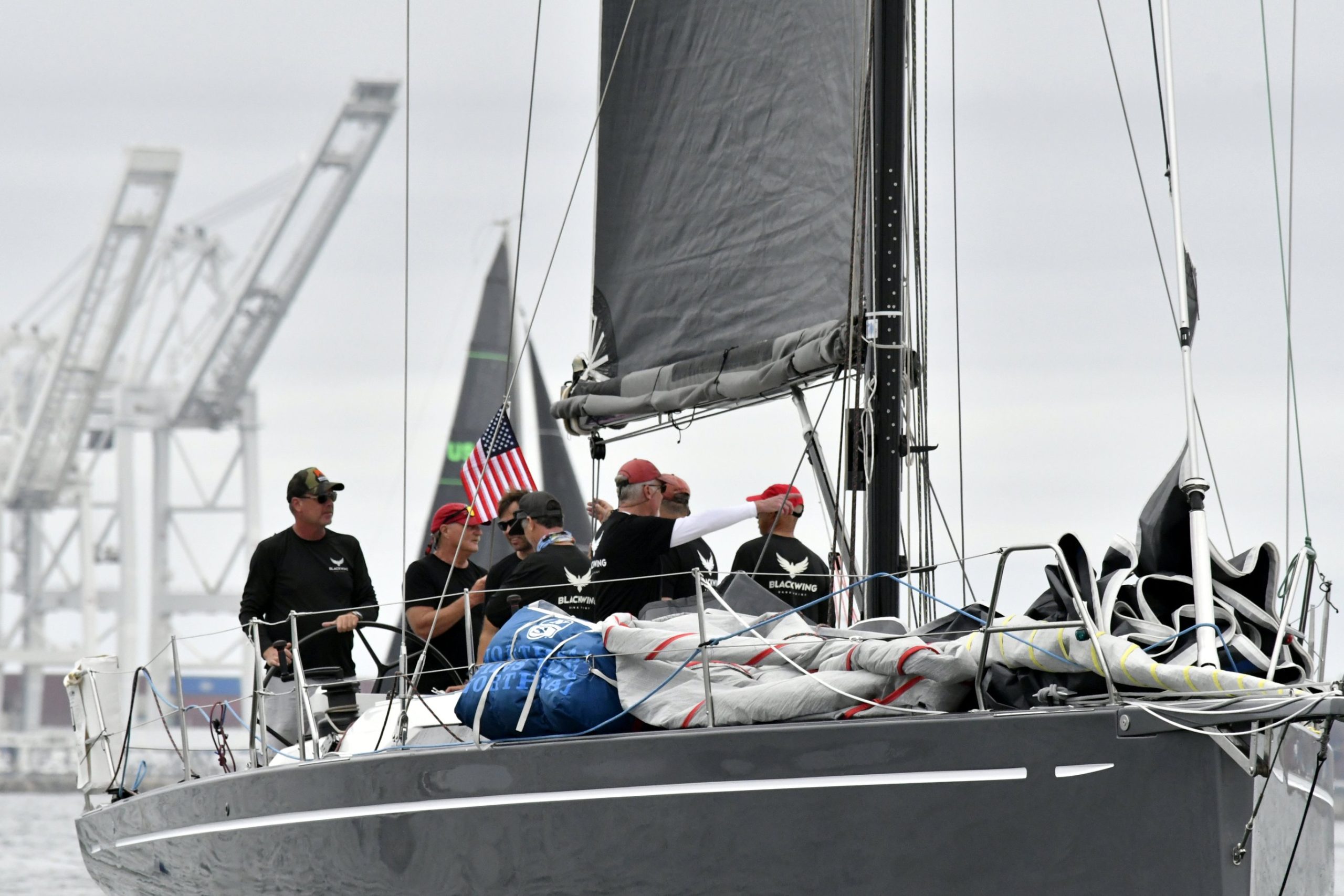Crew working the foredeck during a race